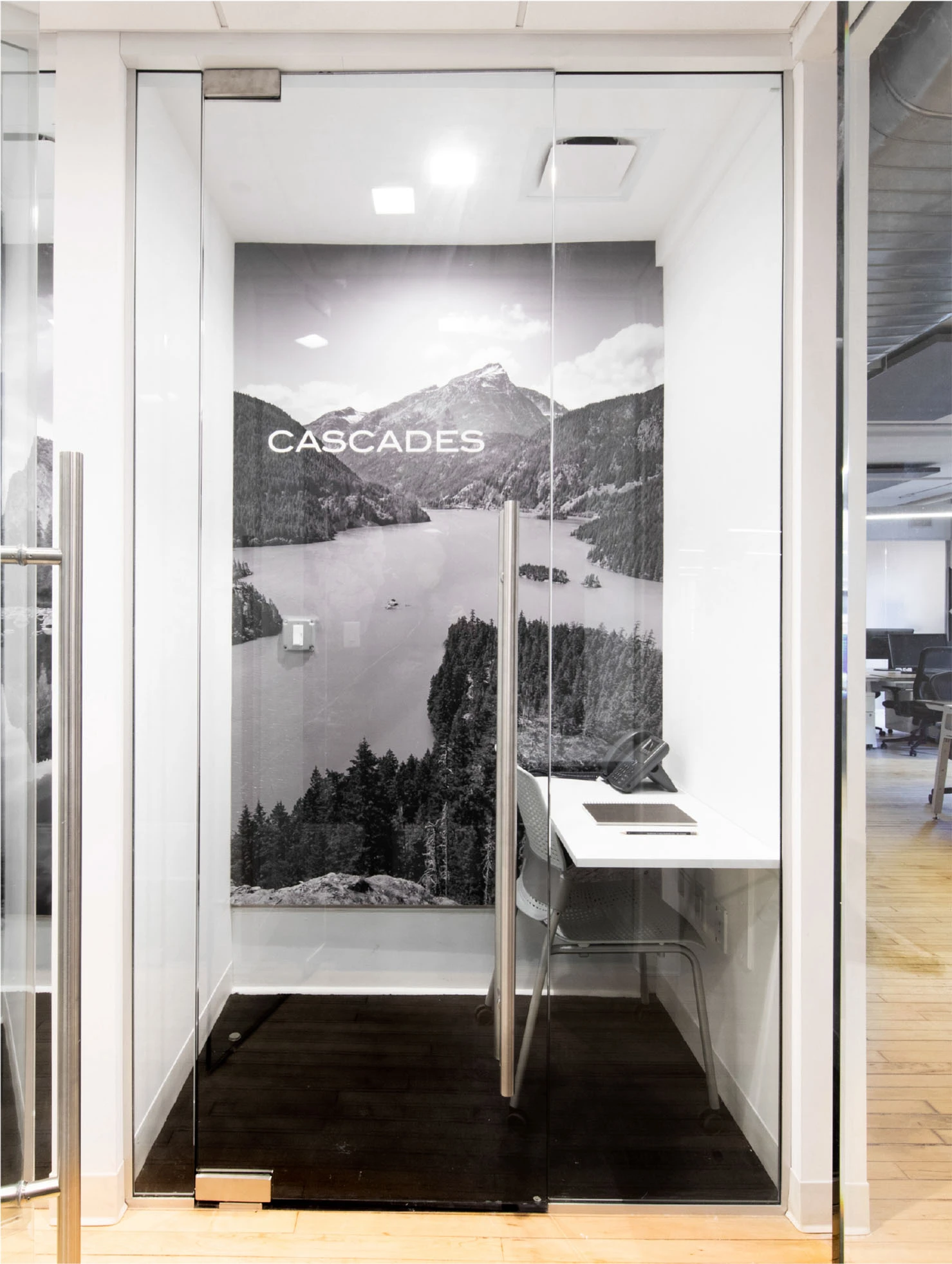 private office phone booth with glass door and black and white color theme